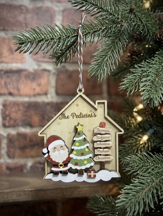 Personalized family ornament hanging on a Christmas tree