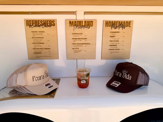 Custom hanging menu boards - Poura Vida booth