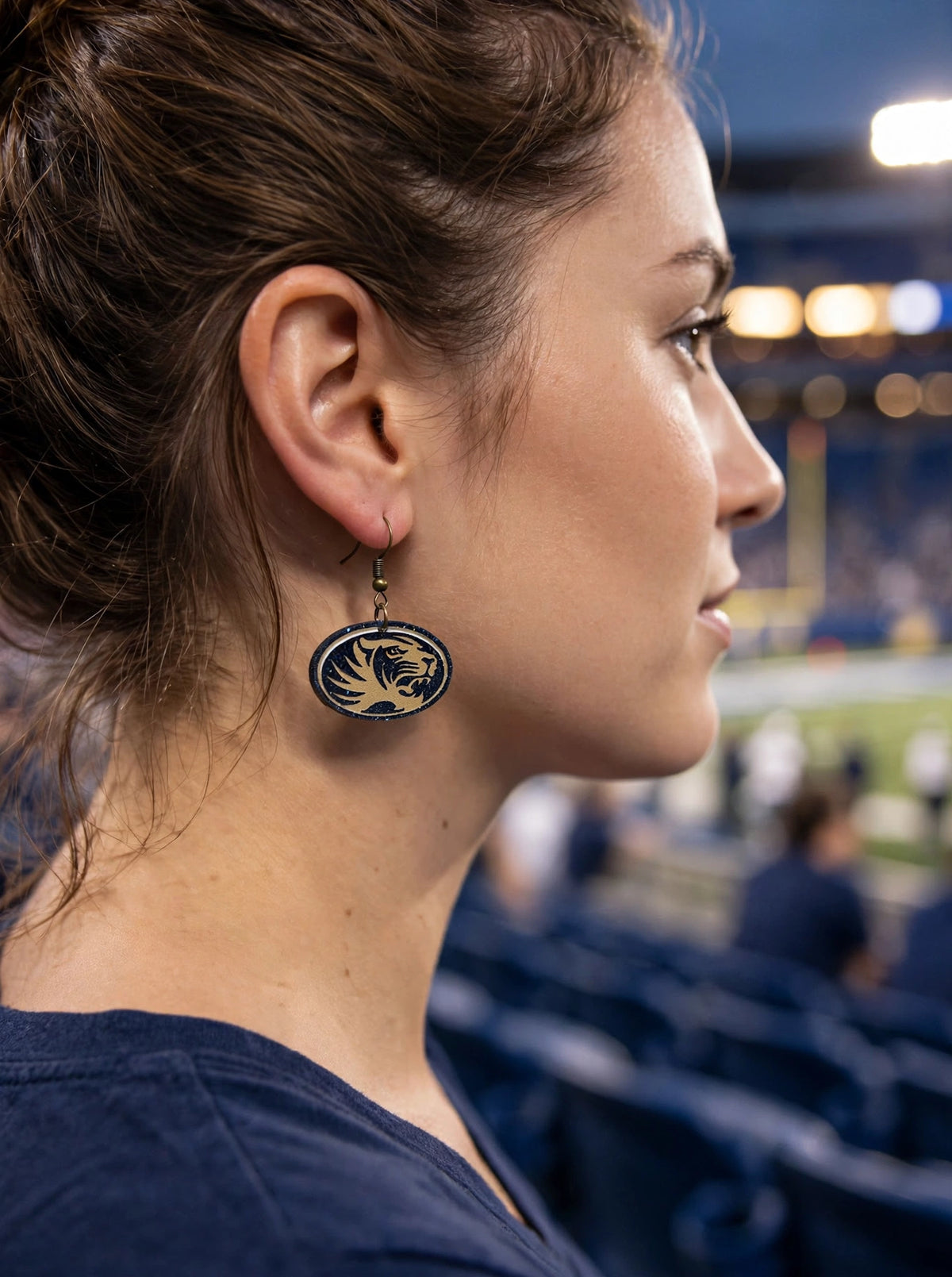 Tiger Oval earrings worn at the stadium