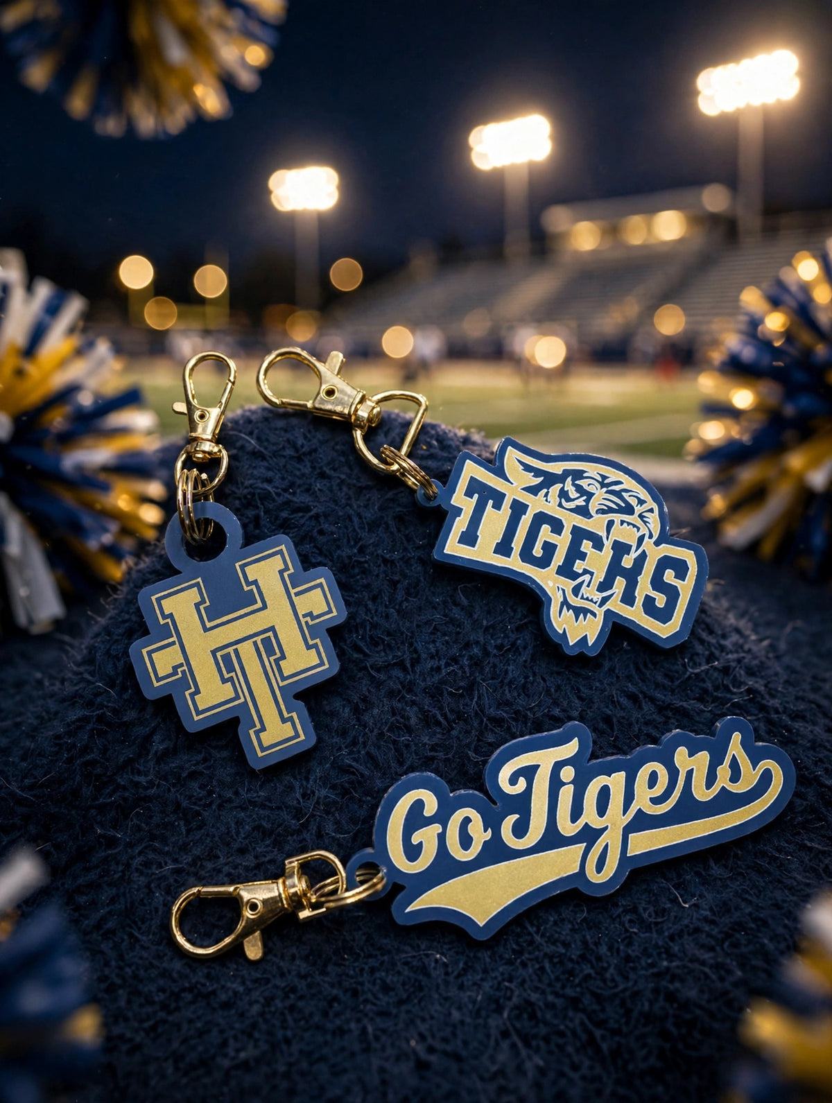 School keychains under the stadium lights