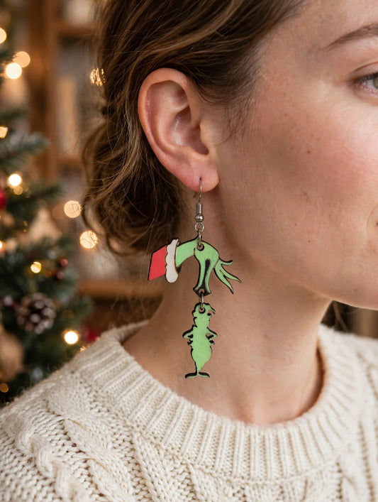 Grinch dangle earrings, worn