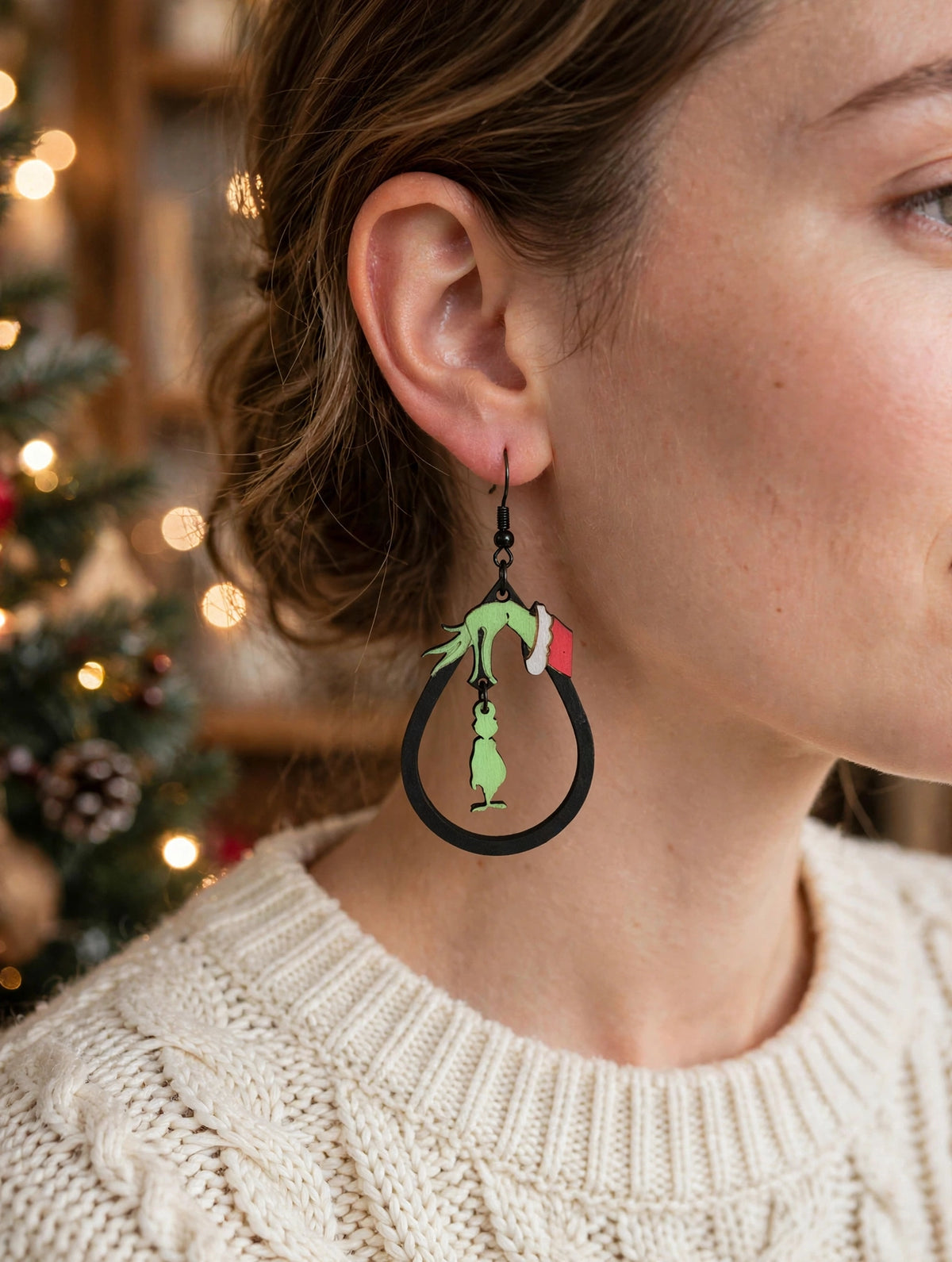 Grinch hoop earrings, worn