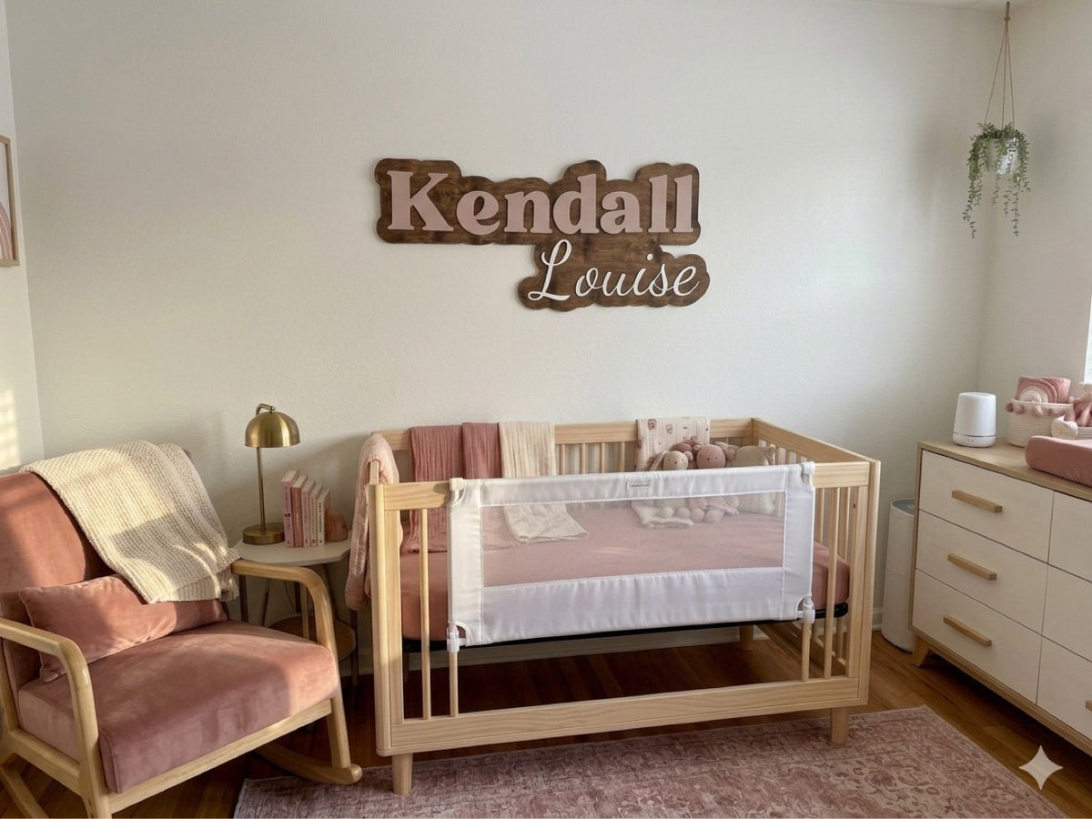 Nursery name sign above a crib - Kendall Louise